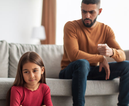 Girl Child Playing at Home Around Parent